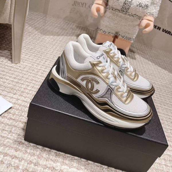 CHANEL CC Logo Cruise Tennis Gold Sneakers
